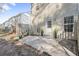 A backyard patio and view of townhouse at 2939 Greyhawk Ln, Cumming, GA 30040