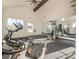 Bright fitness center with various exercise machines, mirrors, and views from the windows at 4987 Kyle Dr, Powder Springs, GA 30127