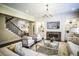 Inviting living room featuring built-in shelving, a fireplace, and comfortable seating at 4987 Kyle Dr, Powder Springs, GA 30127