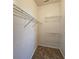 Walk-in closet with carpeted floors and wire shelving at 1109 Willow Crest Way, Austell, GA 30168