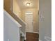 Entryway with stairs leading up, features a white front door and neutral color palette at 1109 Willow Crest Way, Austell, GA 30168