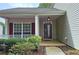Inviting front porch features white columns, red shutters, and manicured landscaping at 1109 Willow Crest Way, Austell, GA 30168