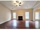 Spacious living room boasts hardwood floors, a fireplace, and ample natural light at 1109 Willow Crest Way, Austell, GA 30168