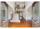 Grand foyer with hardwood floors, staircase, and elegant entryway with double front doors at 3023 Lawson Dr, Marietta, GA 30064