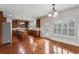 Well-appointed kitchen with granite countertops, hardwood floors, and modern lighting fixtures at 3023 Lawson Dr, Marietta, GA 30064