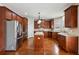 Large kitchen with stainless appliances, granite counters, and hardwood floors at 3023 Lawson Dr, Marietta, GA 30064