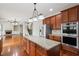 Spacious kitchen featuring a large island, stainless steel appliances, and wooden cabinets at 3023 Lawson Dr, Marietta, GA 30064