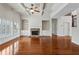 Bright living room featuring a coffered ceiling, fireplace, and built-in bookshelves at 3023 Lawson Dr, Marietta, GA 30064