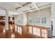 Spacious living area with hardwood floors, fireplace, and view to the kitchen at 3023 Lawson Dr, Marietta, GA 30064