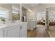 Bright bathroom with double sinks, glass shower, and access to the main bedroom at 53 Colonial Ter, Villa Rica, GA 30180