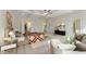 Bright bedroom features neutral tones, an adjacent sitting area and access to en-suite bathroom at 53 Colonial Ter, Villa Rica, GA 30180