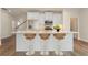 Modern kitchen with stainless steel appliances, spacious island, and sleek countertops offering style and functionality at 53 Colonial Ter, Villa Rica, GA 30180