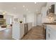 Well-equipped kitchen featuring stainless steel appliances, ample counter space, and seamless flow to the living area at 53 Colonial Ter, Villa Rica, GA 30180