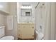 Clean and classic bathroom with tile flooring, shower-tub combo, and large vanity at 643 Longstreet Dr, Marietta, GA 30064