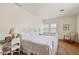 Bright bedroom with large window, white accents, and a comfortable rocking chair at 643 Longstreet Dr, Marietta, GA 30064