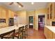 Bright eat-in kitchen featuring custom cabinets, stainless steel appliances, and hardwood floors at 643 Longstreet Dr, Marietta, GA 30064