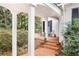 This backyard has a brick patio, covered porch and mature landscaping at 643 Longstreet Dr, Marietta, GA 30064