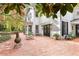 Outdoor brick patio with seating and a decorative fire pit, perfect for entertaining at 643 Longstreet Dr, Marietta, GA 30064