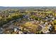 High aerial view of the neighborhood showcasing mature trees and established homes in a great community at 1203 Bonshaw Trl, Marietta, GA 30064
