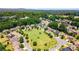 Aerial view of a neighborhood and a common grassy area at 1203 Bonshaw Trl, Marietta, GA 30064