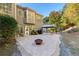 Large backyard featuring a patio, an outdoor grill, and mature trees at 1203 Bonshaw Trl, Marietta, GA 30064