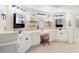 Elegant bathroom with double sinks, a vanity area, and well-lit mirrors for a luxurious feel at 1203 Bonshaw Trl, Marietta, GA 30064