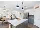 Open concept kitchen and living space with stainless steel appliances and center island at 1203 Bonshaw Trl, Marietta, GA 30064
