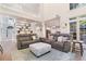 Open-concept living room featuring soaring ceilings and staircase at 1203 Bonshaw Trl, Marietta, GA 30064