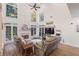 Grand living room boasts soaring ceilings, lots of natural light and a fireplace at 1203 Bonshaw Trl, Marietta, GA 30064