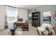 Inviting home office space featuring a stylish desk, comfortable chair, and natural light at 218 Highgrove Way, Dallas, GA 30157