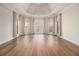 Spacious bedroom features tray ceilings and a wall of sun-drenched windows at 490 Revenna Trl, Fayetteville, GA 30214