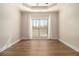 Bright, airy bedroom offers ample space and natural light from a large window at 490 Revenna Trl, Fayetteville, GA 30214
