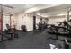 Basement gym is furnished with weights and exercise equipment on a rubber floor at 490 Revenna Trl, Fayetteville, GA 30214
