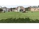 Expansive backyard featuring a lush lawn and patio, perfect for outdoor entertaining at 50 Cannonade Ct, Covington, GA 30016