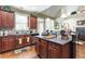 The well-appointed kitchen offers ample counter space and is seamlessly connected to the living areas at 50 Cannonade Ct, Covington, GA 30016