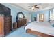 Large main bedroom boasting tray ceilings, spacious layout, and walk-in closet at 50 Cannonade Ct, Covington, GA 30016