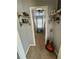 Hallway with decorative shelves and a guitar adding a touch of personality at 77 Russell Rd, Lawrenceville, GA 30043
