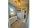 Bright mudroom featuring built-in storage and charming decor at 77 Russell Rd, Lawrenceville, GA 30043
