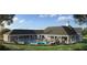 Upscale community clubhouse with a large pool, lounge chairs, and covered seating areas for residents at 18 Torry Pines Cir, Villa Rica, GA 30180