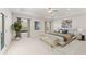 Spacious main bedroom with a tray ceiling, large windows, and neutral decor at 18 Torry Pines Cir, Villa Rica, GA 30180