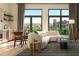 A cozy living area filled with natural light, comfortable sofa, and an inviting atmosphere with views at 567 Ponce De Leon Ne Ave # 312, Atlanta, GA 30308