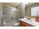 Bathroom featuring vanity, toilet and shower with sliding glass doors at 6645 Country Lake Rd, Cumming, GA 30041