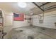 Spacious garage with an American flag at 6645 Country Lake Rd, Cumming, GA 30041