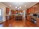 Modern kitchen featuring granite countertops, stainless steel appliances, and a center island, perfect for culinary enthusiasts at 6645 Country Lake Rd, Cumming, GA 30041
