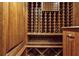 Wine cellar featuring wood racks and built-in cabinetry at 1402 Downington Nw Vw, Acworth, GA 30101