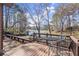Charming deck area with seating and lake views at 3093 Brookshire Way, Duluth, GA 30096