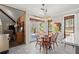 Kitchen nook featuring wooden table and chairs with a view of the living room and back yard at 3093 Brookshire Way, Duluth, GA 30096