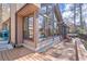 Exterior view shows lake views, a deck, and large windows at 3093 Brookshire Way, Duluth, GA 30096