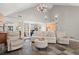 Spacious living room with high ceilings, neutral furniture, and stone flooring at 3093 Brookshire Way, Duluth, GA 30096