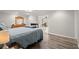 Main bedroom with wood floors and view to the sitting room with fireplace at 3093 Brookshire Way, Duluth, GA 30096